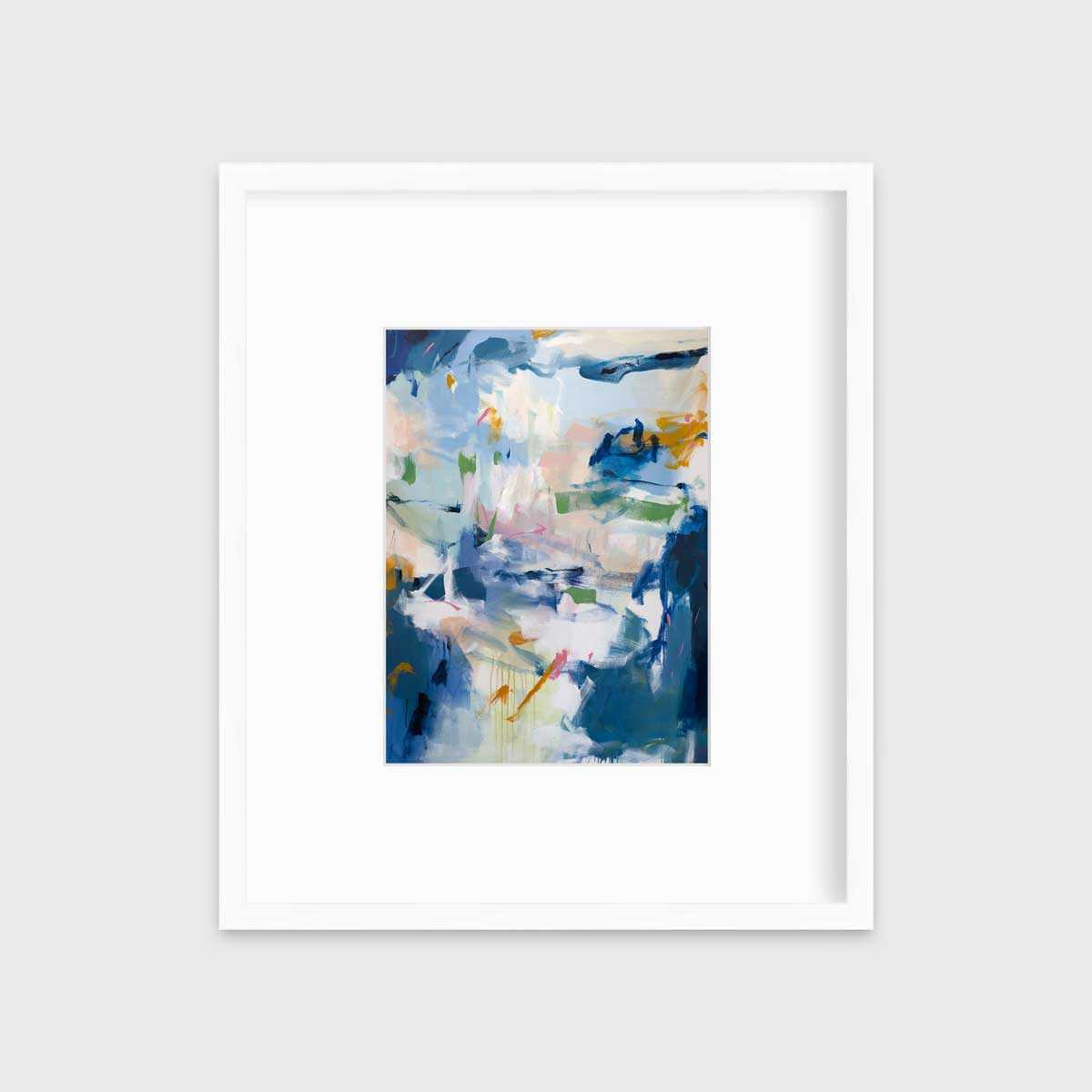 A blue abstract print in a white frame with a mat hangs on a white wall.