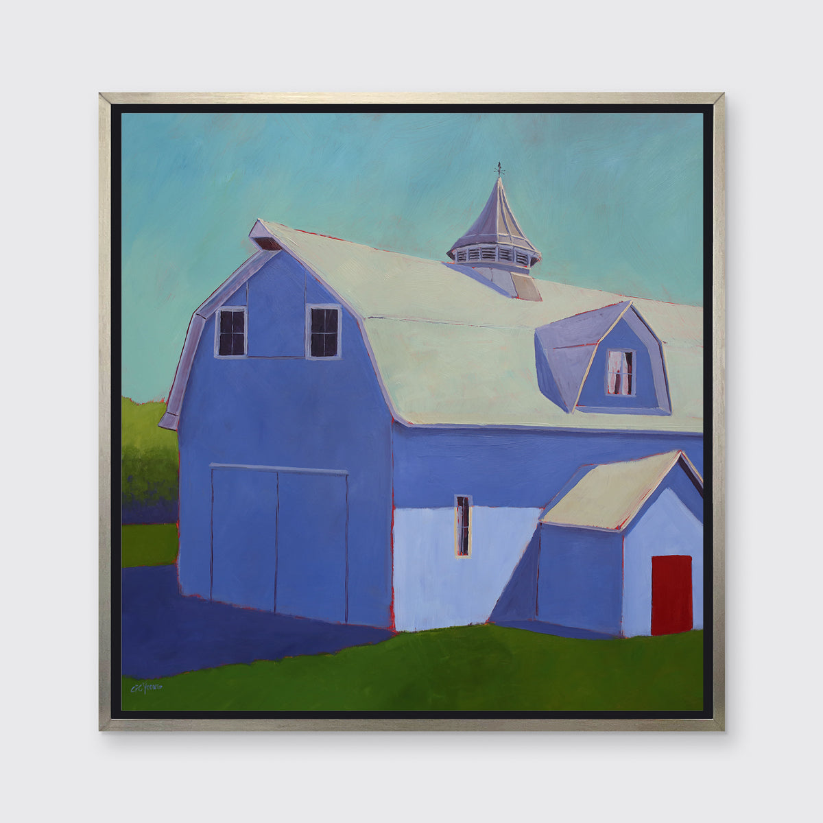 A light blue, lavender and beige contemporary barn print in a silver floater frame hangs on a white wall.