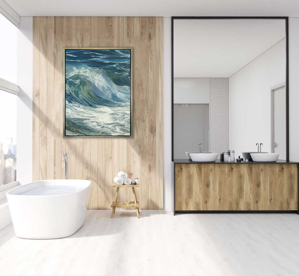 A blue, teal, white and light green abstract water wave print in a silver floater frame hangs on a wood wall above a white bathtub and a side table with rolled towels.