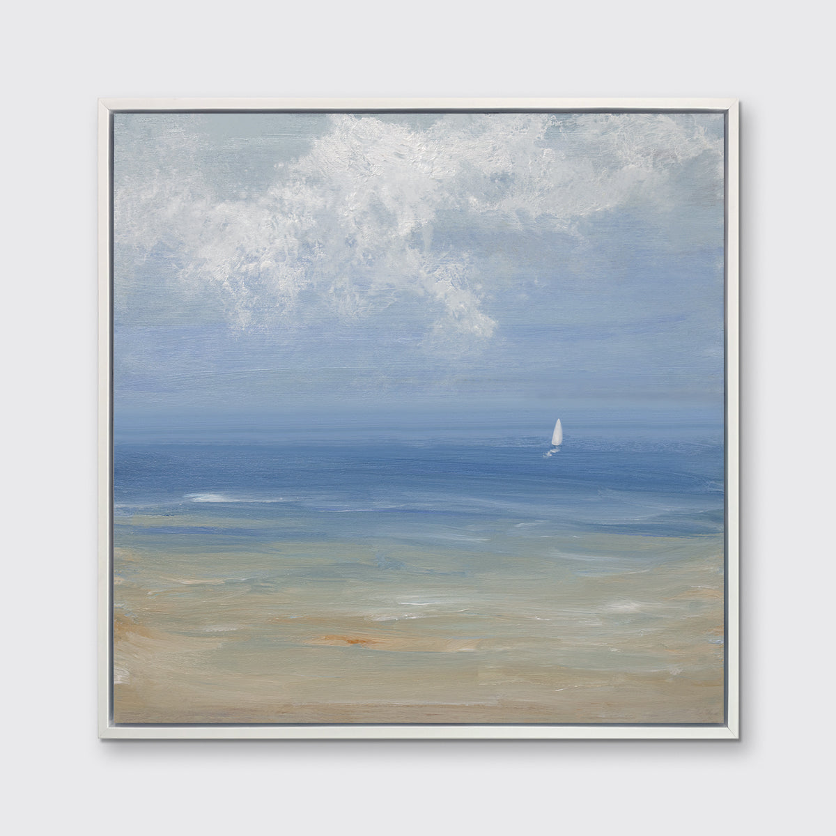 A blue, light green, beige and white abstract seascape print with a small sailboat in a white floater frame hangs on a white wall.