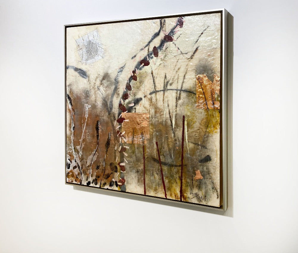 A right-hand side-angle view of a nature-inspired abstract painting by Linda Bigness hanging on a white wall. 