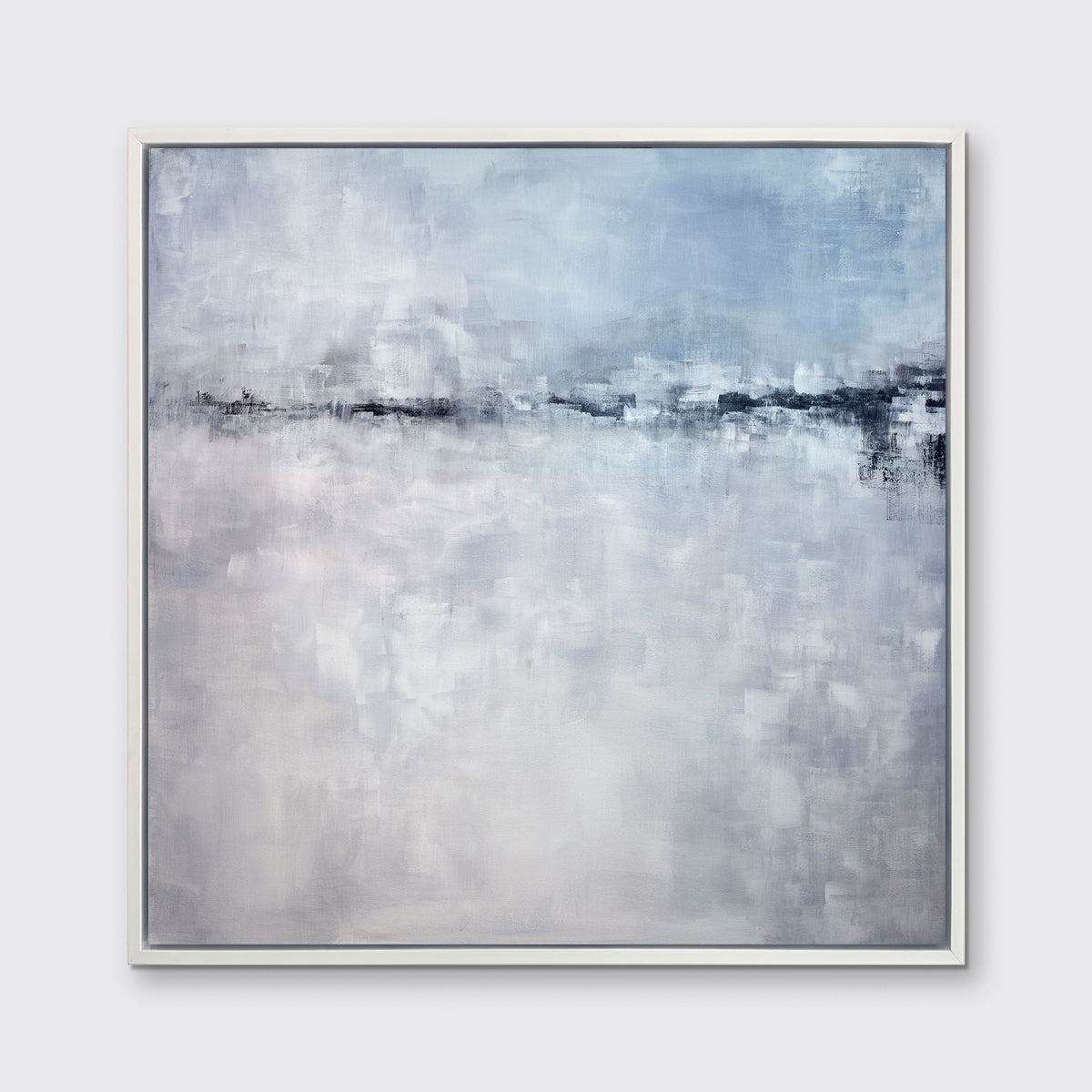 A blue and grey abstract print in a white floater frame hangs on a white wall.