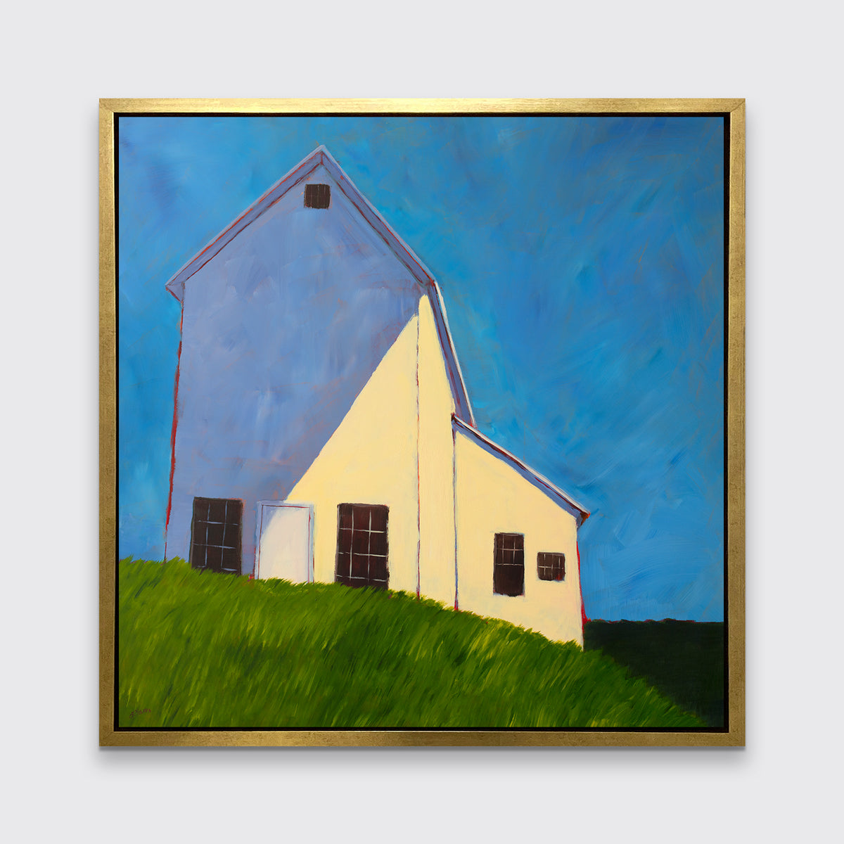 A blue, beige, lavender and green contemporary barn print in a gold floater frame hangs on a white wall.
