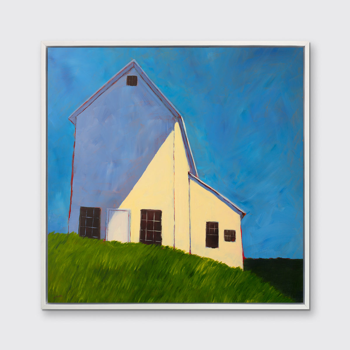 A blue, beige, lavender and green contemporary barn print in a white floater frame hangs on a white wall.