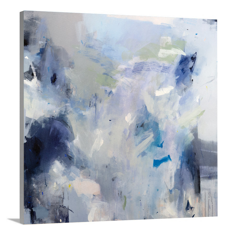 A side-angle view of a blue, white, lavender and dark blue abstract print on canvas.