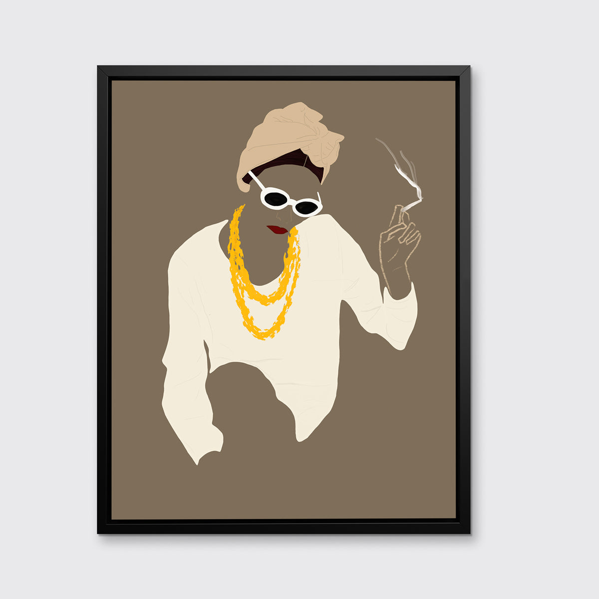 Pop art print of a woman holding a lite cigarette hangs in a black floater frame on a white wall.