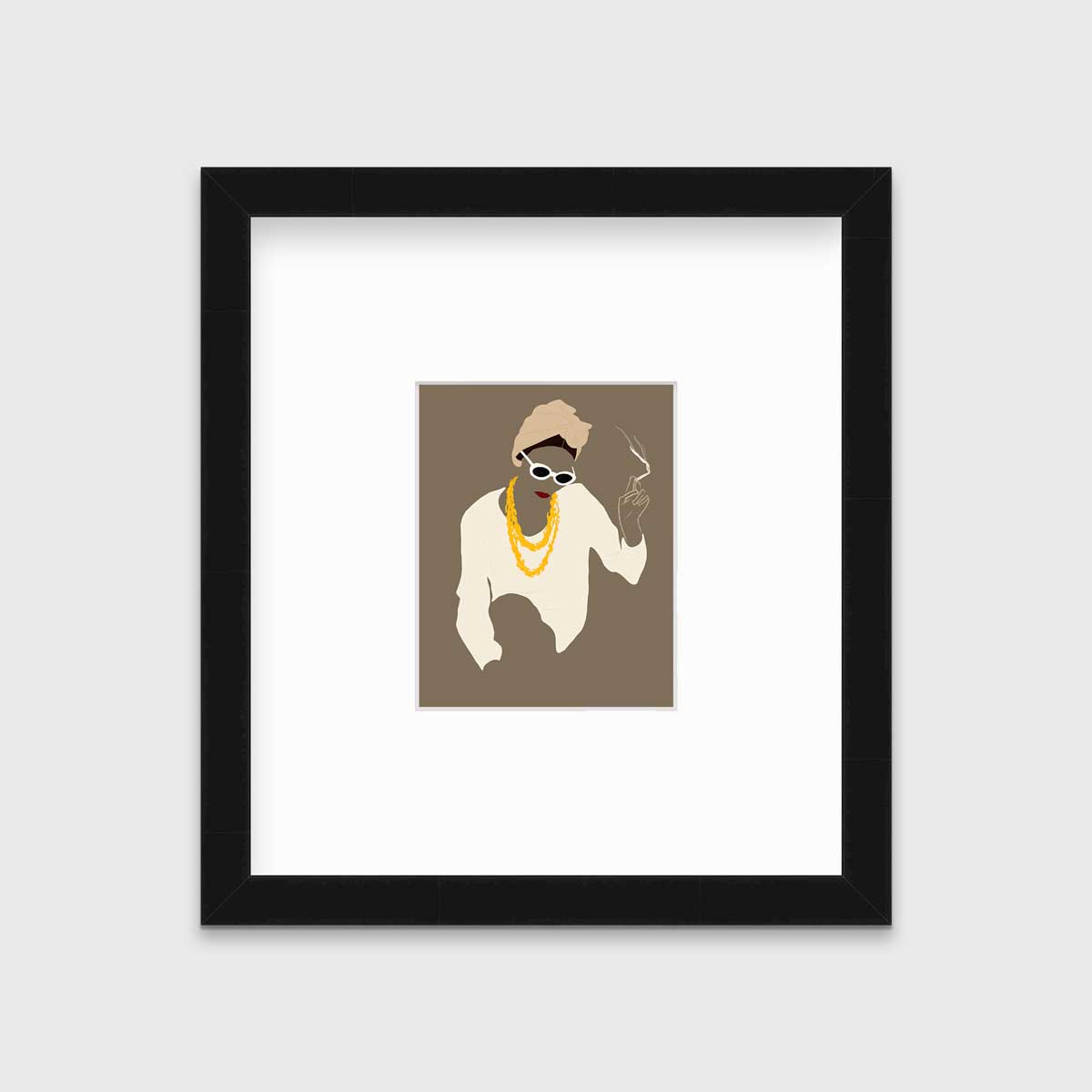 Pop art print of a woman holding a lite cigarette hangs in a black frame with a mat on a white wall.