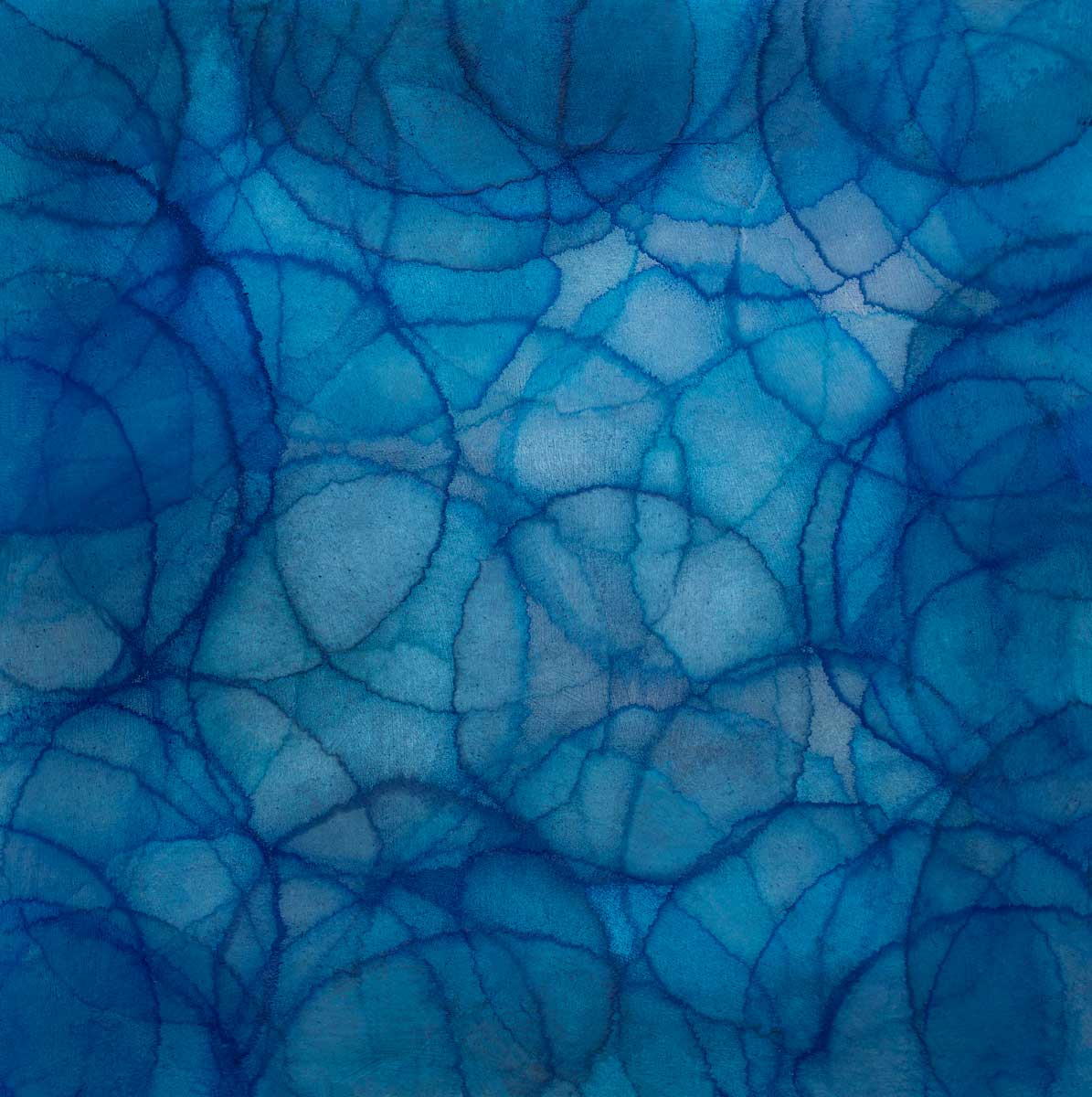 layers of overlapping circles in gradations of blue