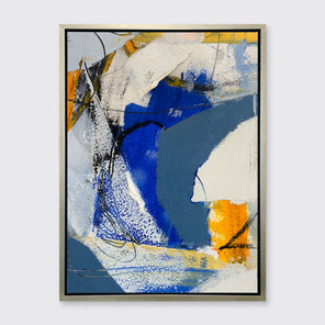 A blue, grey and yellow abstract print in a silver floater frame hangs on a white wall.