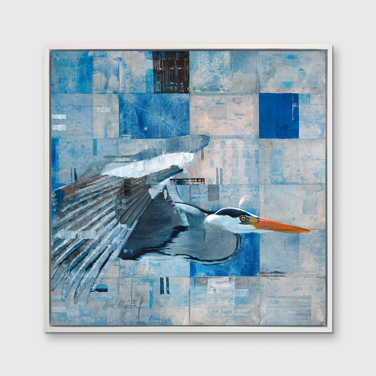 A blue abstract print of a blue heron in flight in a white floater frame hangs on a white wall.
