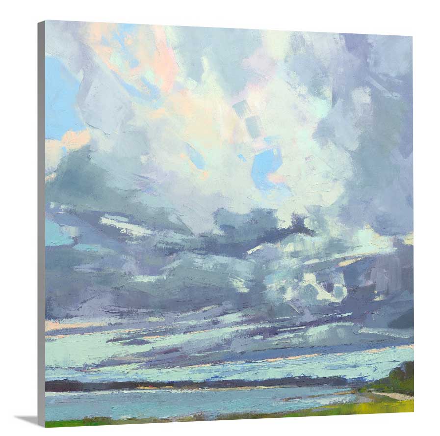 A side-angle view of a blue, white and green abstract landscape print on canvas.
