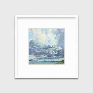 A blue, white and green abstract landscape print in a white frame with a mat hangs on a white wall.