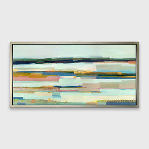 A multicolored abstract print in a silver floater frame hangs on a white wall.