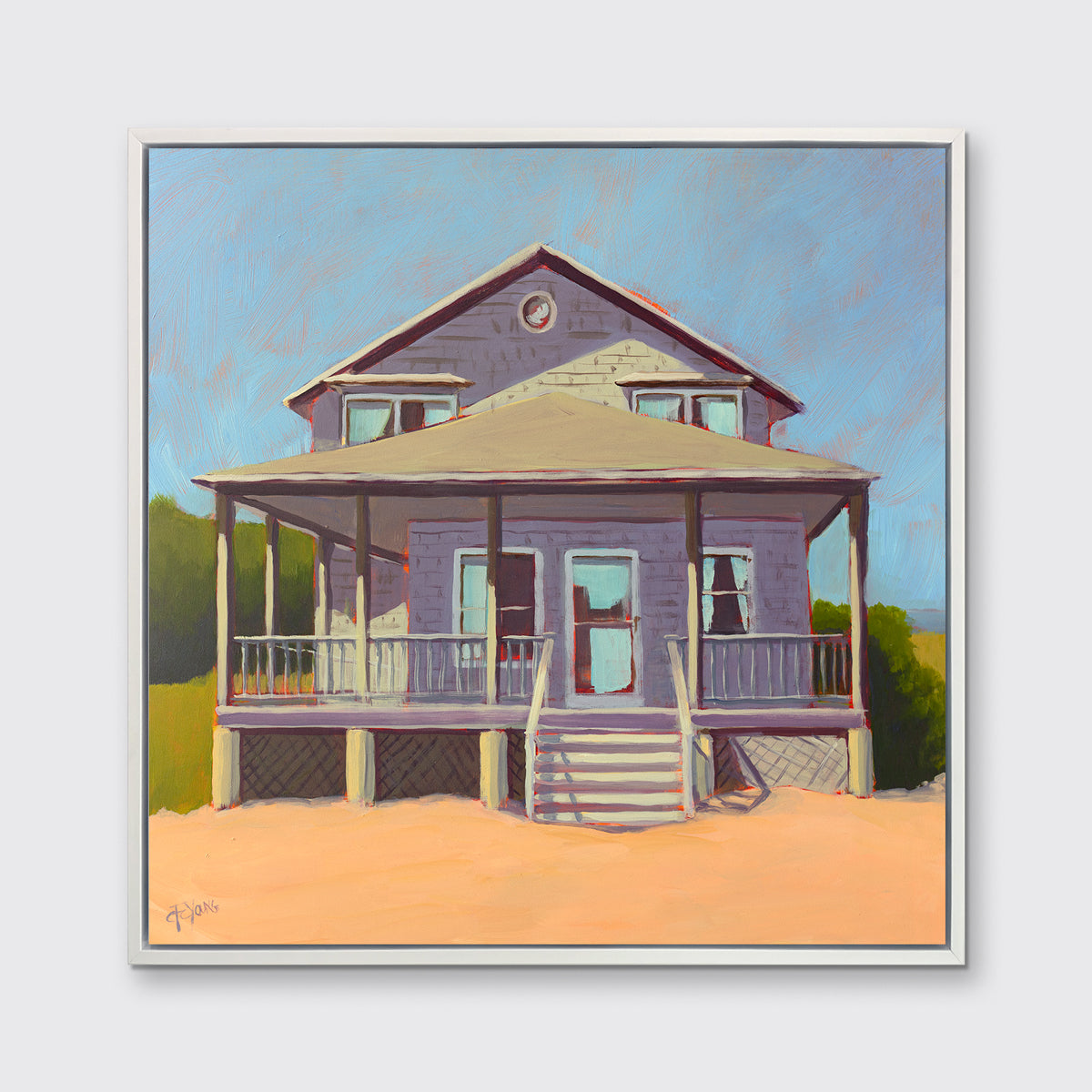 A blue, lavender and peach contemporary beach house print in a white floater frame hangs on a white wall.