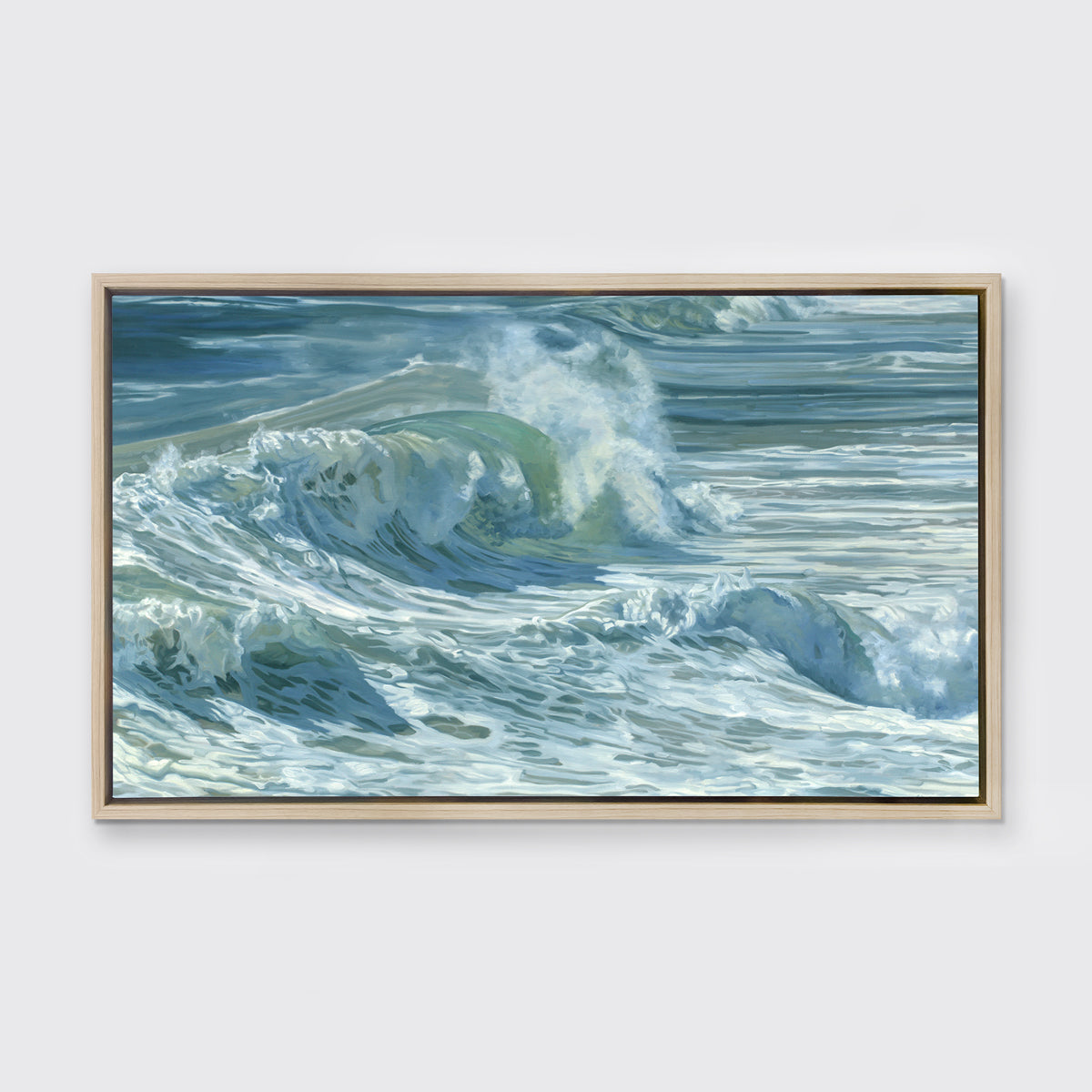 Rolling waves on a side angle with tones of blue, green and white staged in a white floater frame on a wall.
