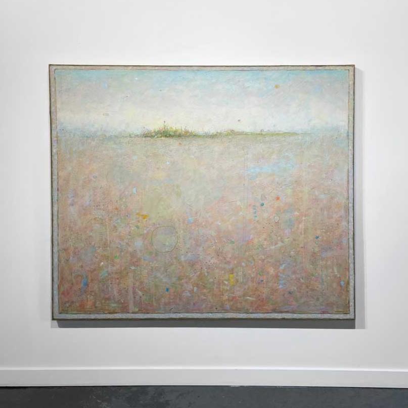 A peach and blue abstract landscape by Elwood Howell hangs on a white wall.