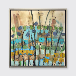A blue, green, gold and brown abstract floral print in a silver floater frame hangs on a white wall.