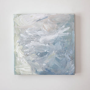 A painting is hanging on a wall. Its surface is decorated with white, blue and green paint in a thick impasto. Wired and ready to hang.