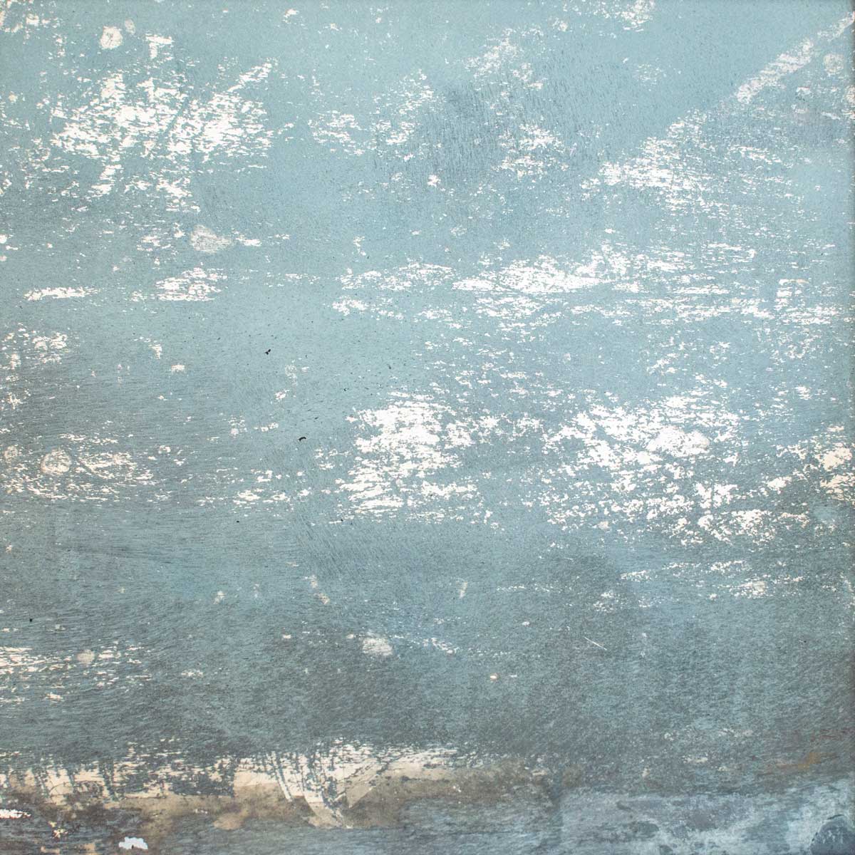 A small light blue and silver painted art mirror by Alina B.