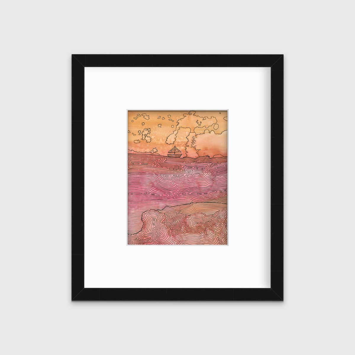 A orange, pink and black abstract landscape with a sailboat in a black frame with a mat hangs on a white wall.