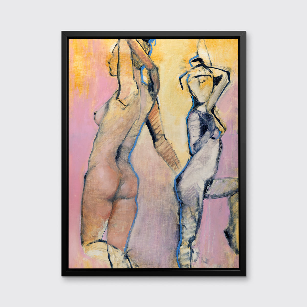 A pink, yellow, blue and black abstract figurative print of two women in a black floater frame hangs on a white wall.
