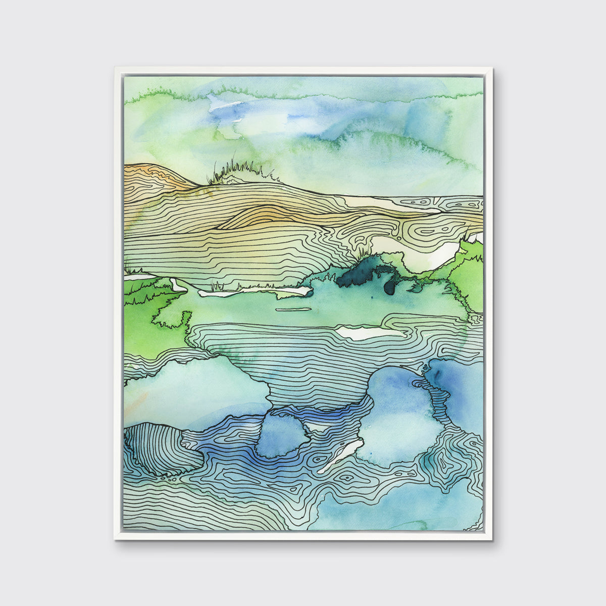 A green and blue landscape illustration print framed in a white floater frame hangs on a light grey wall.