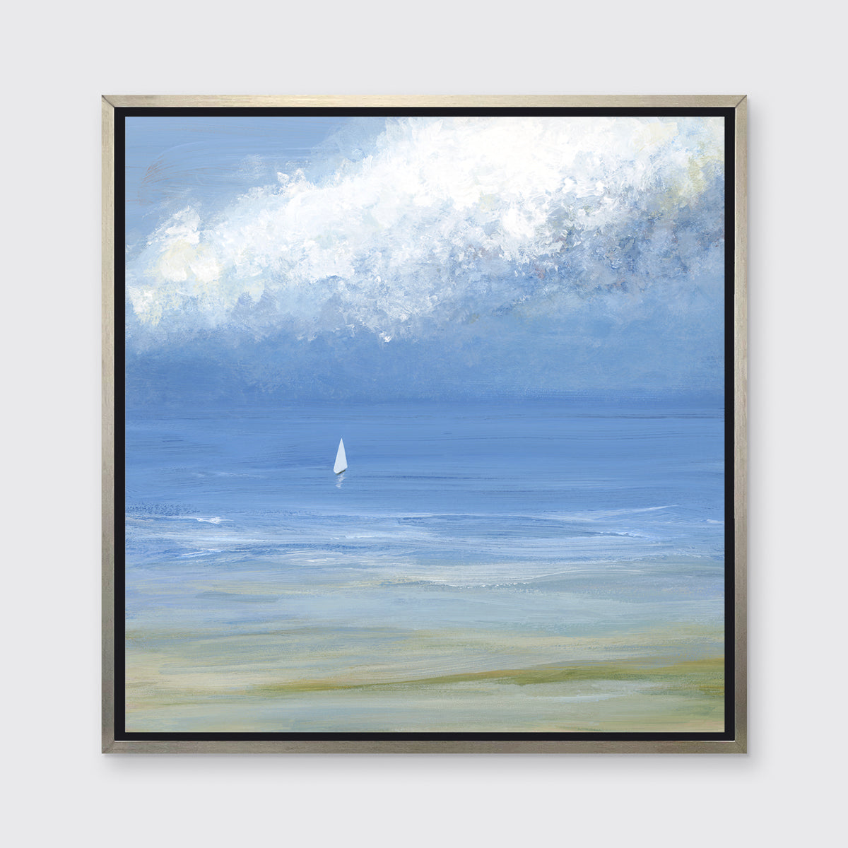 A blue, light green and white abstract seascape print with a small sailboat in a silver floater frame hangs on a white wall.