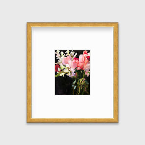 A pink, black and green abstract floral print in a gold frame with a mat hangs on a white wall.
