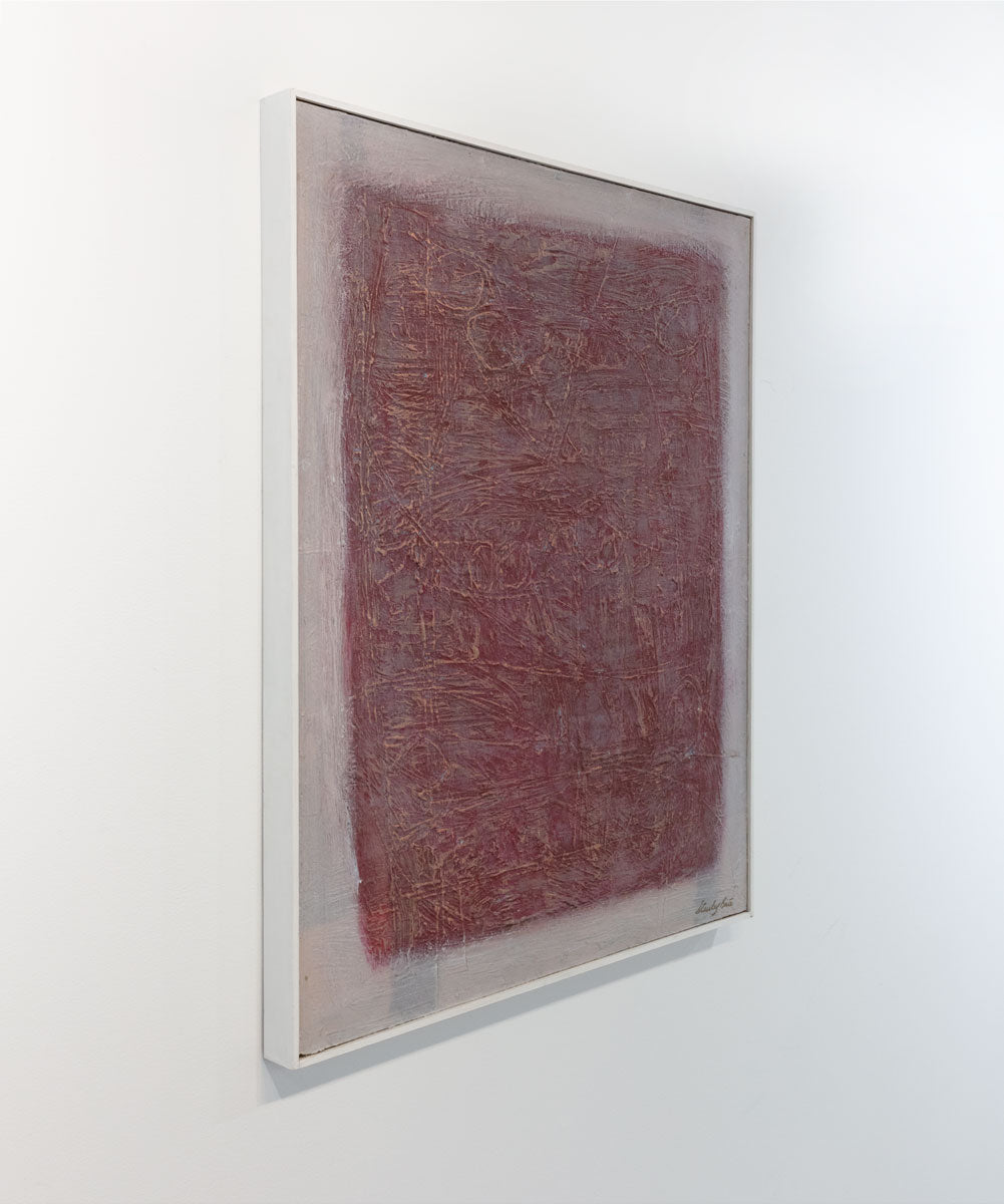 A white and red painting with a scratched, textured surface is seen at an angle. The painting is wired and ready to hang.
