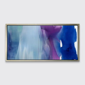 A blue and purple abstract print framed in a warm silver floater frame hangs on a light grey wall.