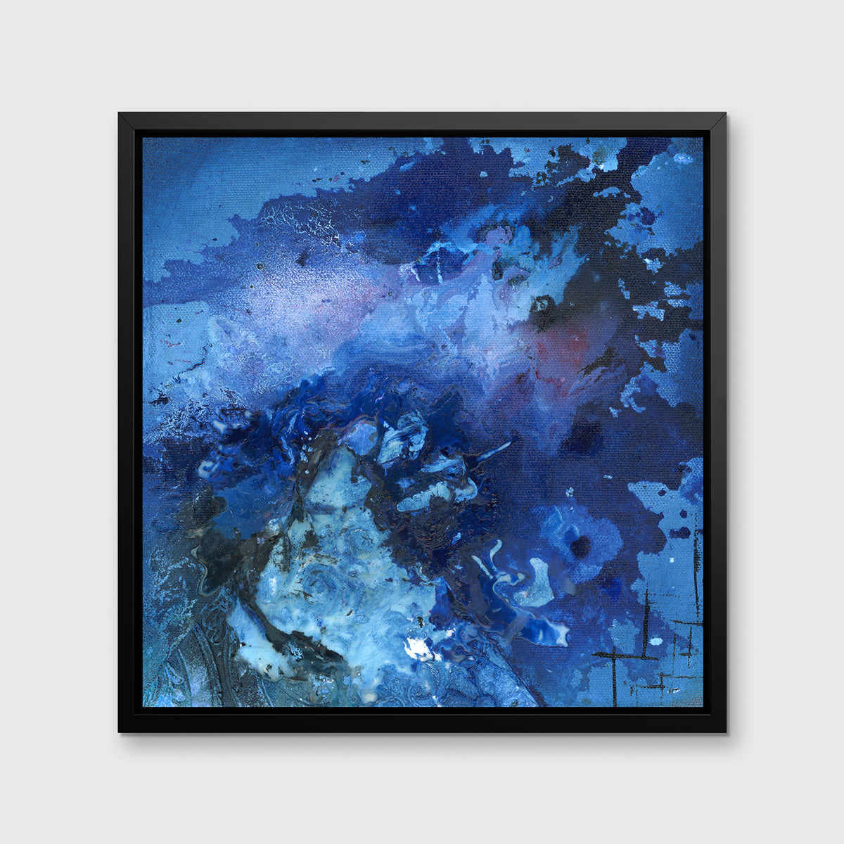 A blue and black abstract print in a black floater frame hangs on a white wall.