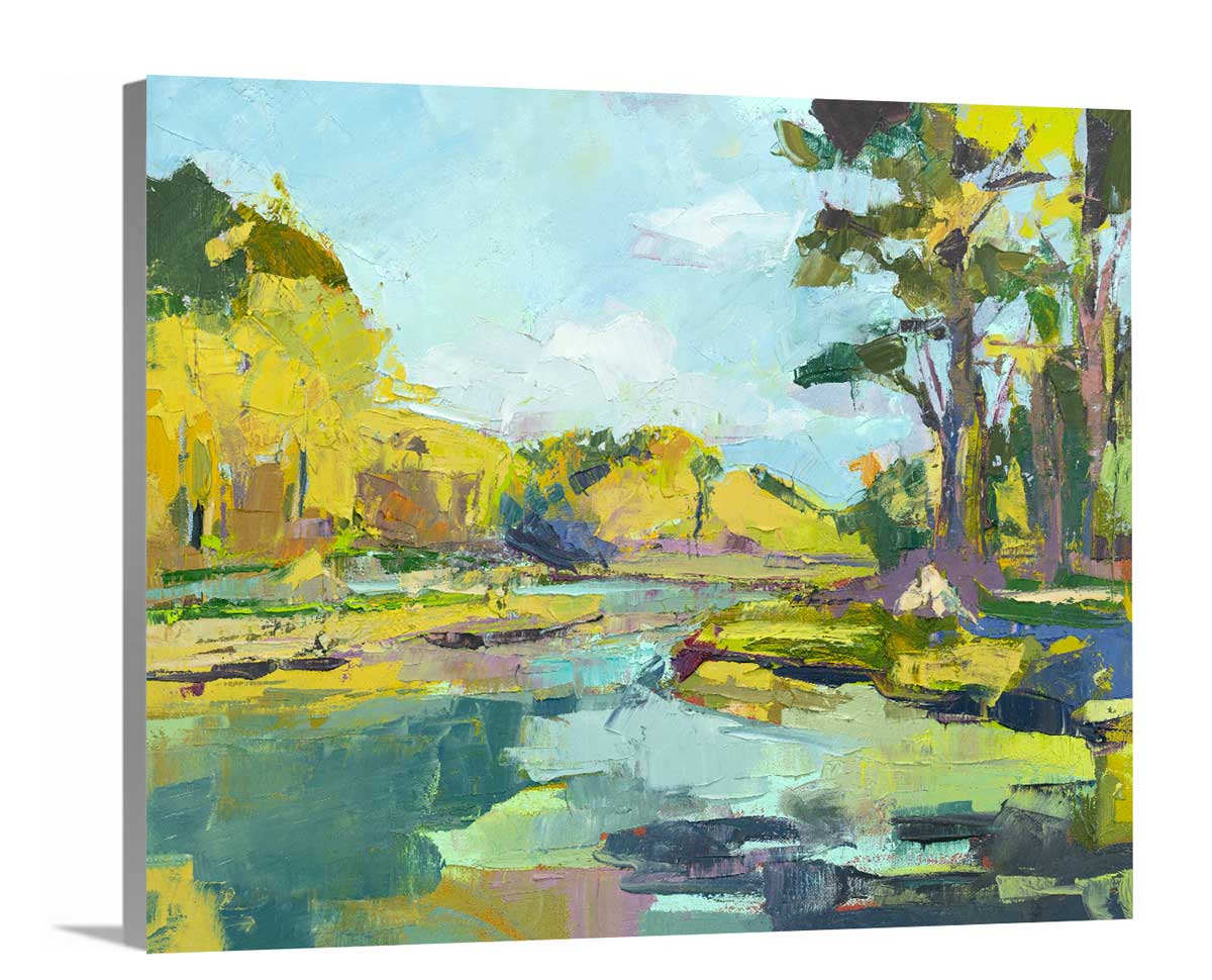 A side-angle view of a chartreuse, light blue and green abstract landscape print on canvas.