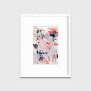 A pink and white abstract print by Kelly Rossetti in a white frame with a mat hangs on a white wall.