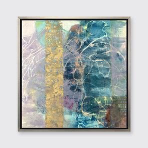 A blue, purple and gold abstract print in a silver floater frame hangs on a white wall.