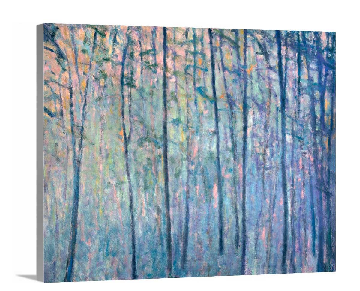 A side-angle view of a multicolored abstract tree landscape print on canvas