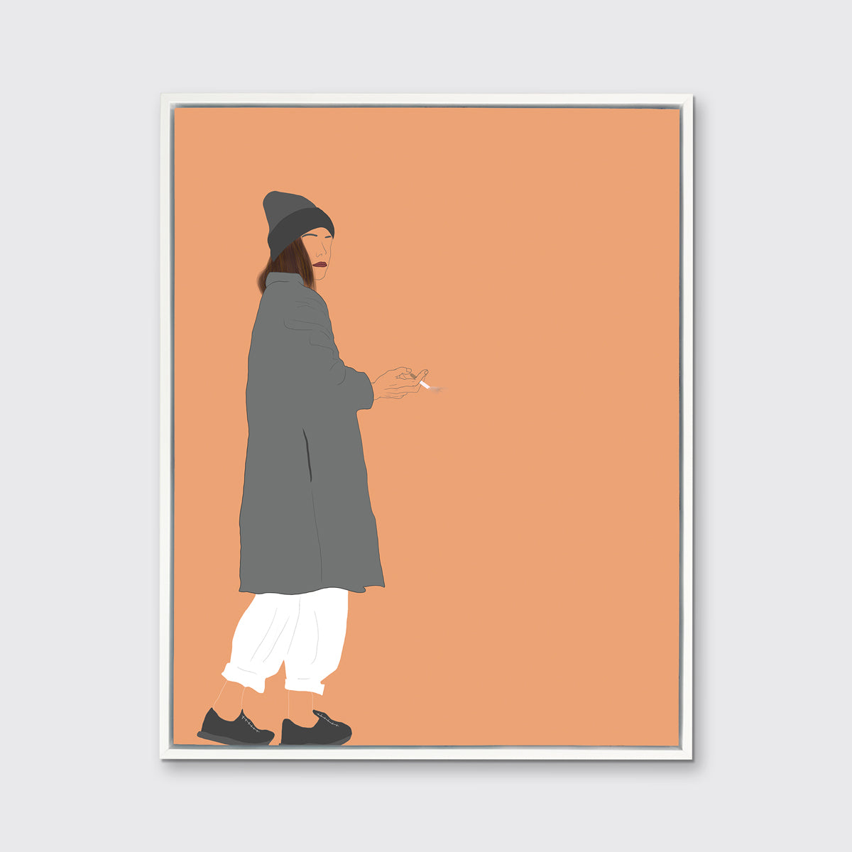 Art print of an illustrated woman wearing grey hat and coat, white pants, and grey sneakers, holding a cigarette, framed in a white floater frame on a grey wall.