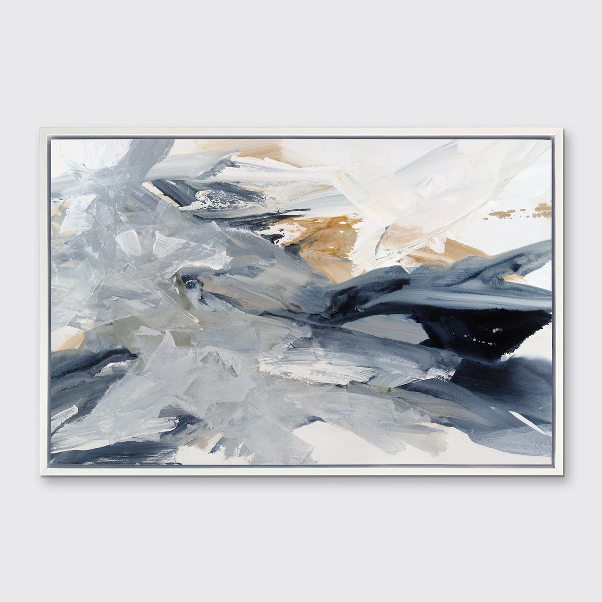 A grey, blue, gold and white abstract print in a white floater frame hangs on a white wall.