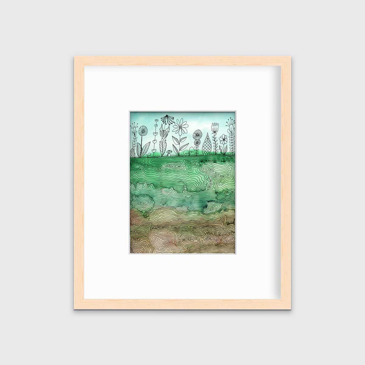 A green, light blue and brown botanical illustration print in a natural wood frame with a mat hangs on a white wall.