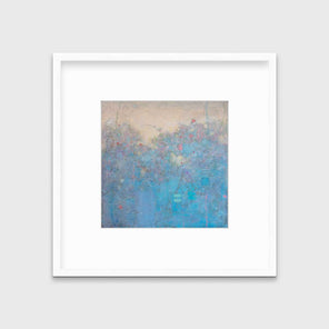 A blue abstract landscape print in a white frame with a mat hangs on a white wall.