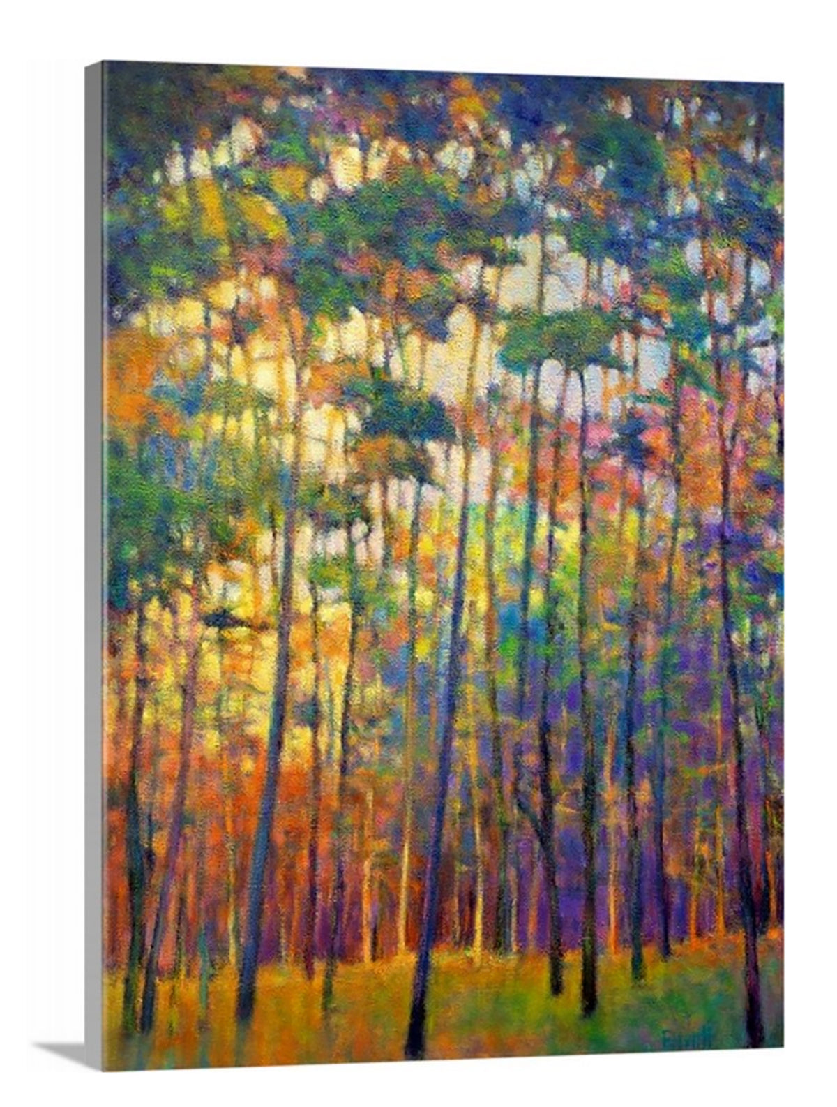 A side-angle view of a multicolored abstract tree landscape print on canvas.