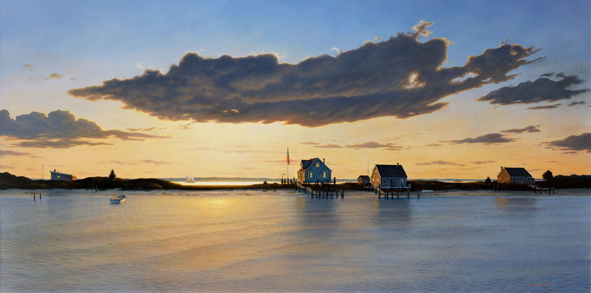 A print of sunset in the sound with the Bay Houses along the water. A small row boat rests to the left, in the background is the other side of this small inlet with a sailboat, the sunlight is the strongest in the center, some clouds reflect the sun setting as they are more silhouetted. 