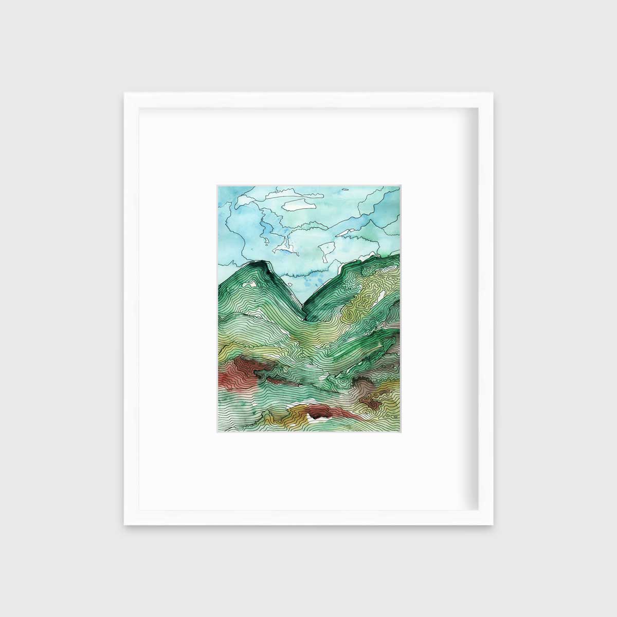 A blue, green and black abstract landscape print in a white frame with a mat hangs on a white wall.