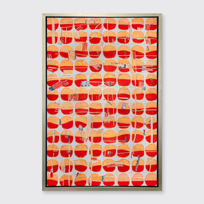 A red, orange and light blue abstract print in a silver floater frame hangs on a white wall.