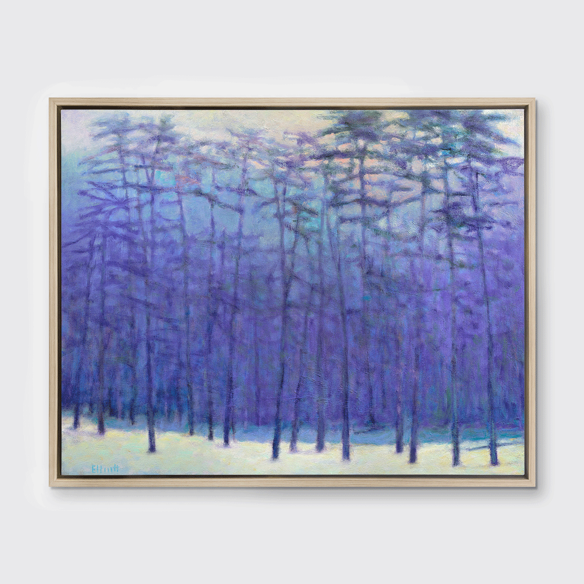 A blue, purple, light pink and soft yellow impressionistic landscape print in a white oak wood floater frame hangs on a white wall.