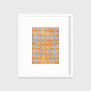 A orange and light purple abstract circle print in a white frame with a mat hangs on a white wall.