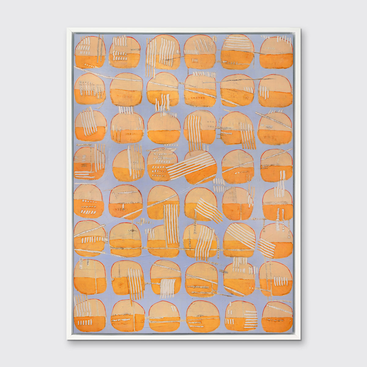 A orange and light purple abstract circle print in a white floater frame hangs on a white wall.