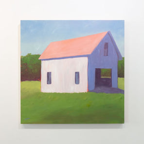 A painting of a white barn with a salmon roof in a green field with a pale blue sky background is hung on a gallery wall.