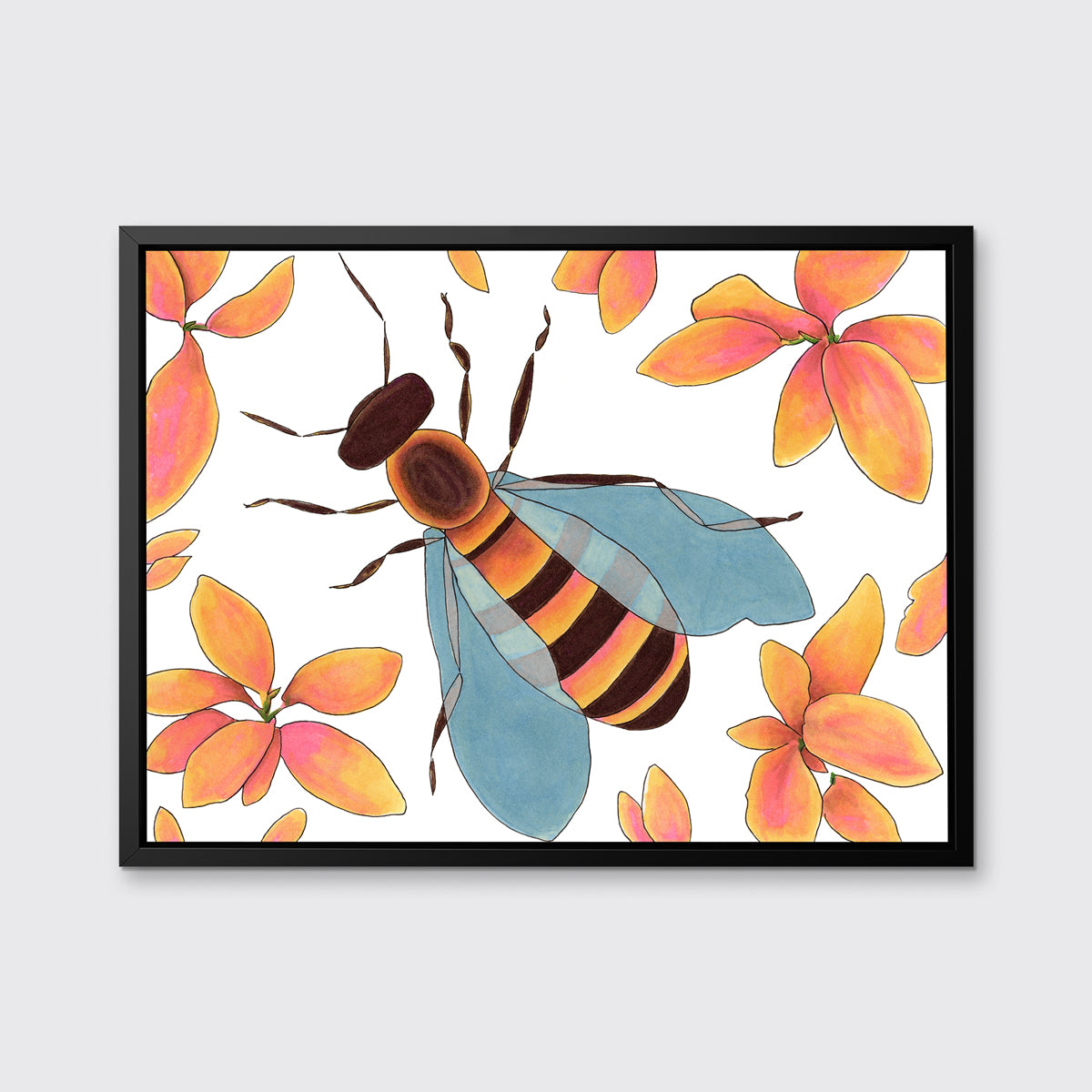 A bee surrounded by orange and pink flowers in a black floater frame hangs on a white wall.