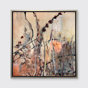 A beige, copper, brown, gold and silver abstract print in a silver floater frame hangs on a white wall.