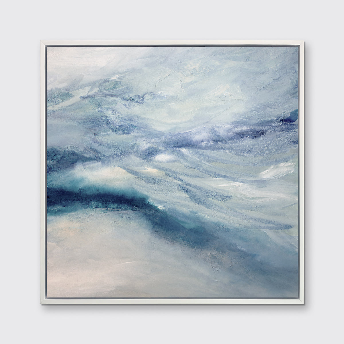 A blue, white, teal and light purple abstract print in a white floater frame hangs on a white wall.